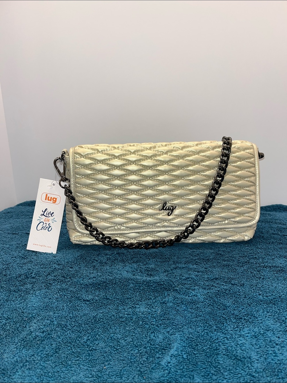 LUG - Strut Shoulder Bag in Metallic Champagne with Boho Floral Interior - BNWT